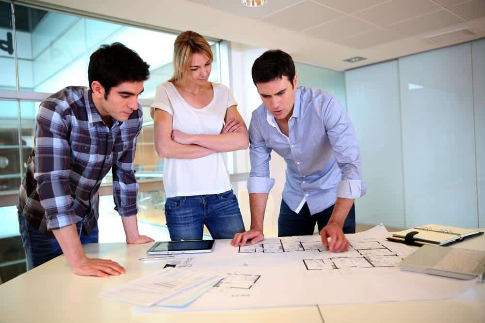 Team of architects working on flexible workspace plans