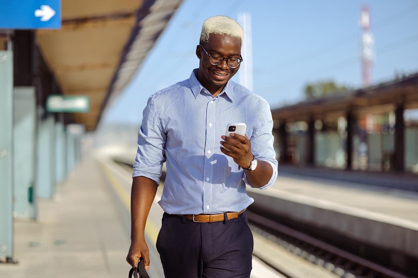 Young African American business man using smart phone