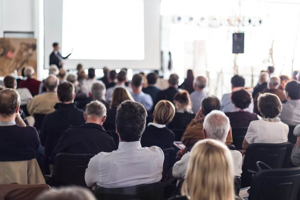 Speaker giving a talk in conference hall at business event