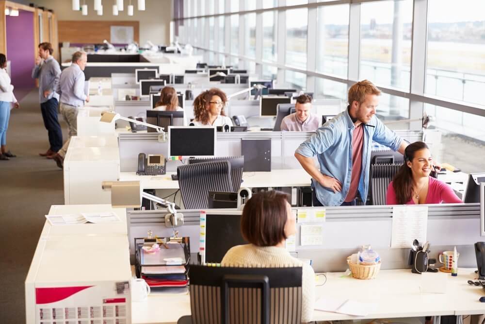 rows of desks in office