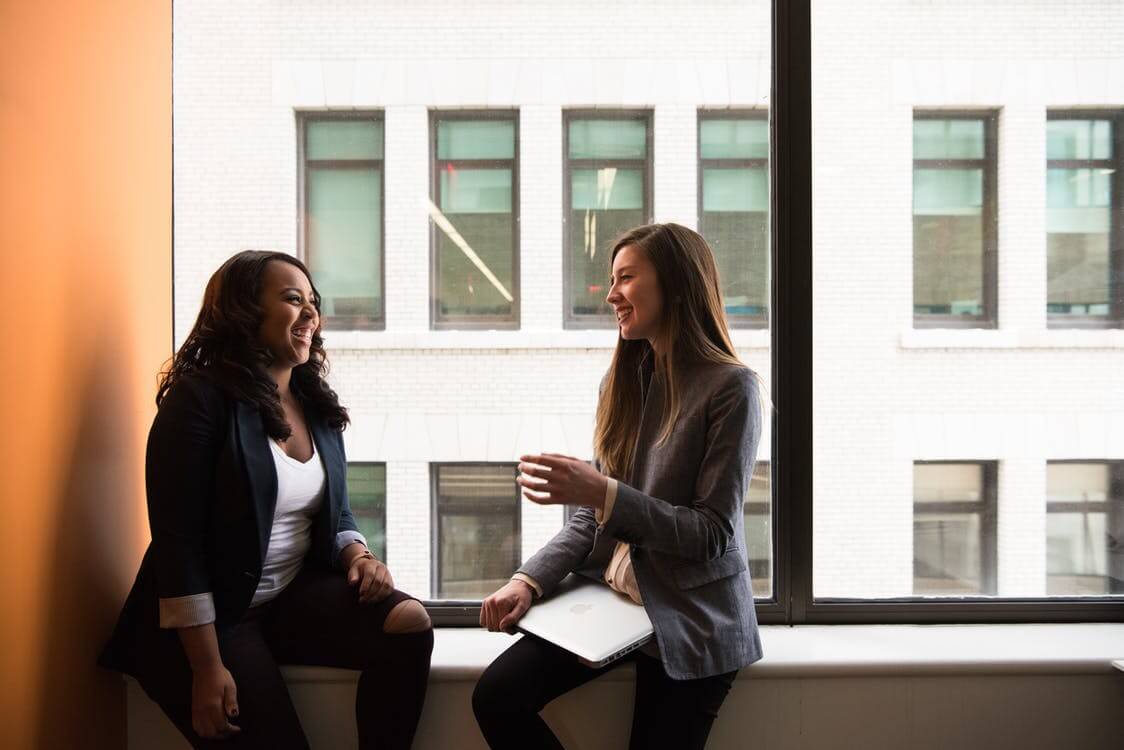 happy workers meeting window engagement