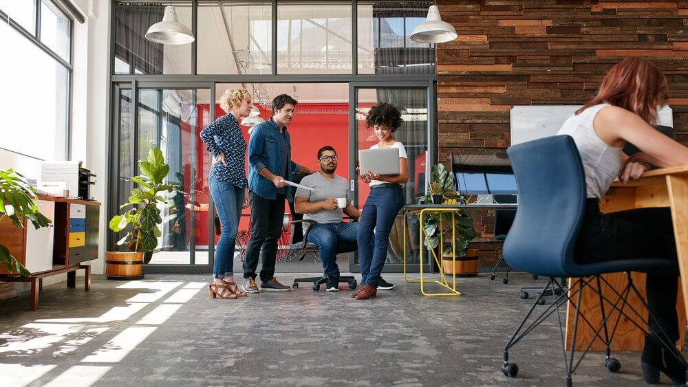 employees talking in the office employees talking in the office