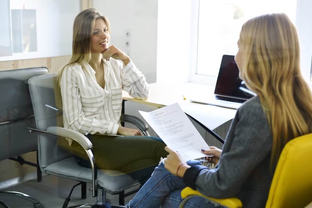 FM having a convesation and asking questions with employee FM having a convesation and asking questions with employee