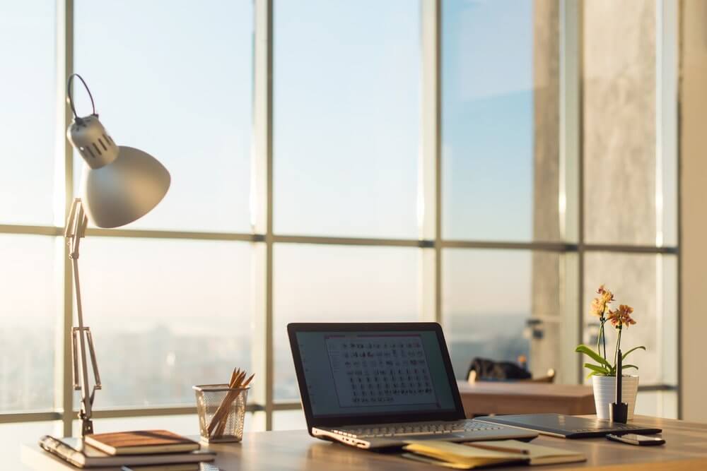 office desk and lamp by window