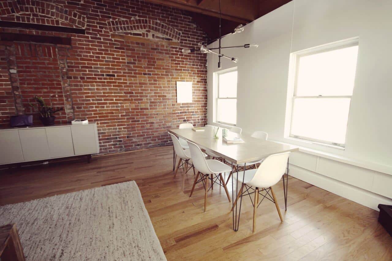 open modern office with white table and chairs