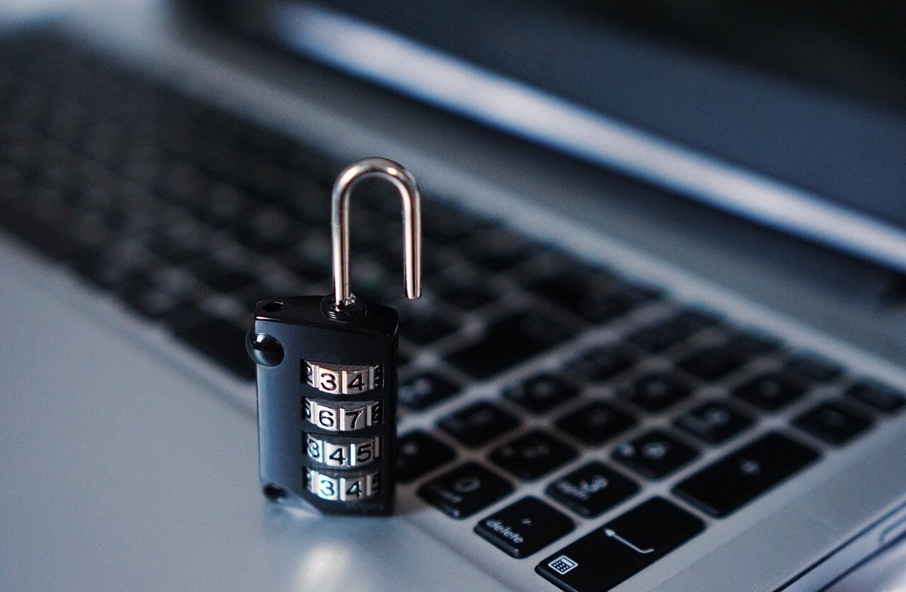 a padlock on a laptop keyboard