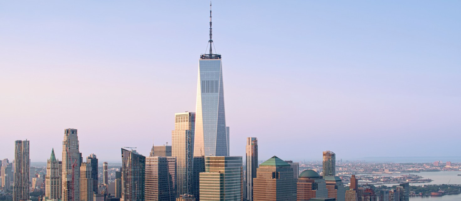 Lower Manhattan skyline and One World Trade Center near 7 World Trade Center, where OfficeSpace Software opened a new office in New York City.