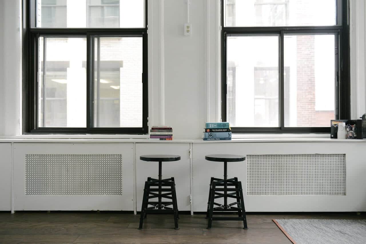 white office with two stools white office with two stools