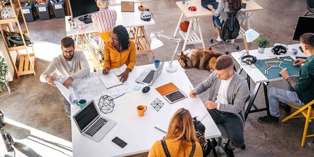 Business colleagues analyzing new project at office