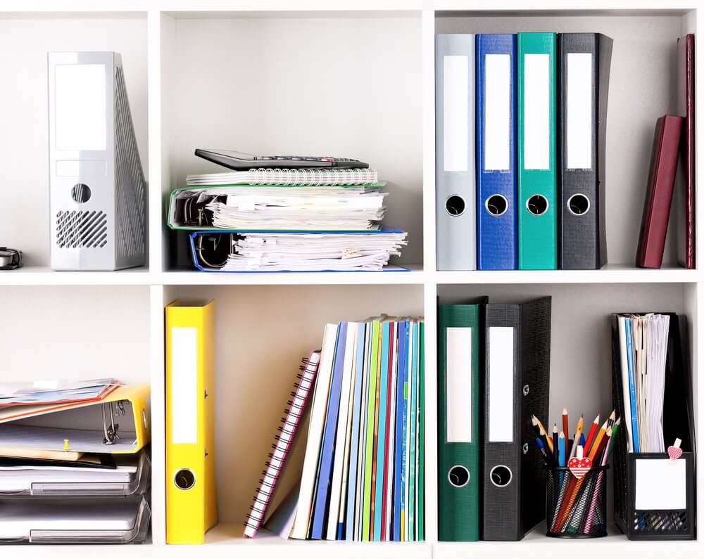 office supplies and files in shelves