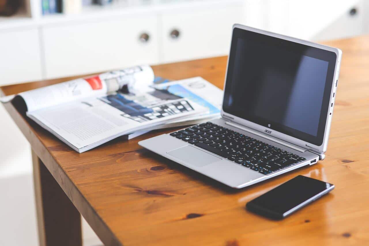 laptop and phone on desk