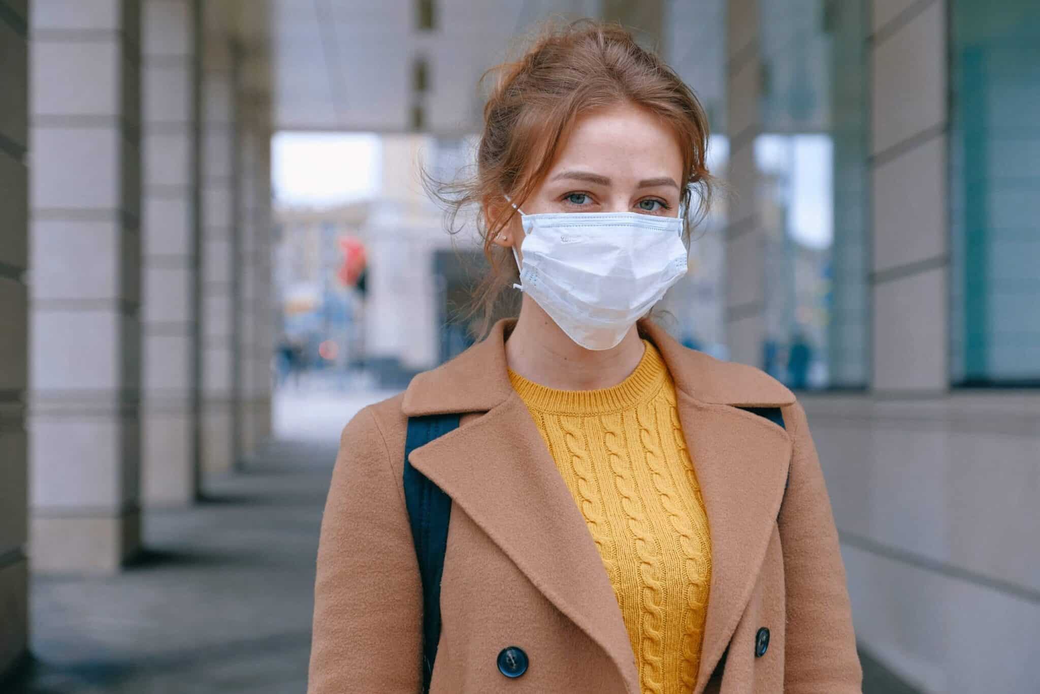 woman wearing PPE mask